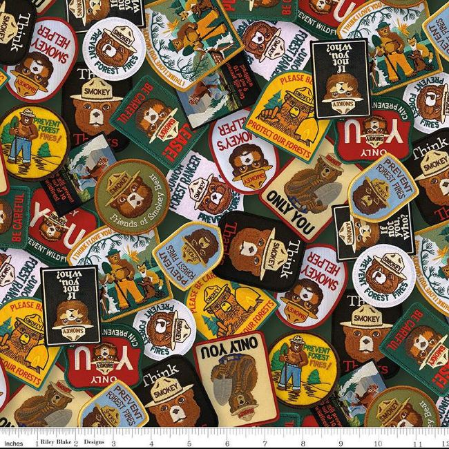 Cotton Friends of Smokey Bear Wilderness Badges Signs Packed Officially Licensed by Riley Blake Brown Cotton Fabric Print by the Yard (CD16506-MULTI)