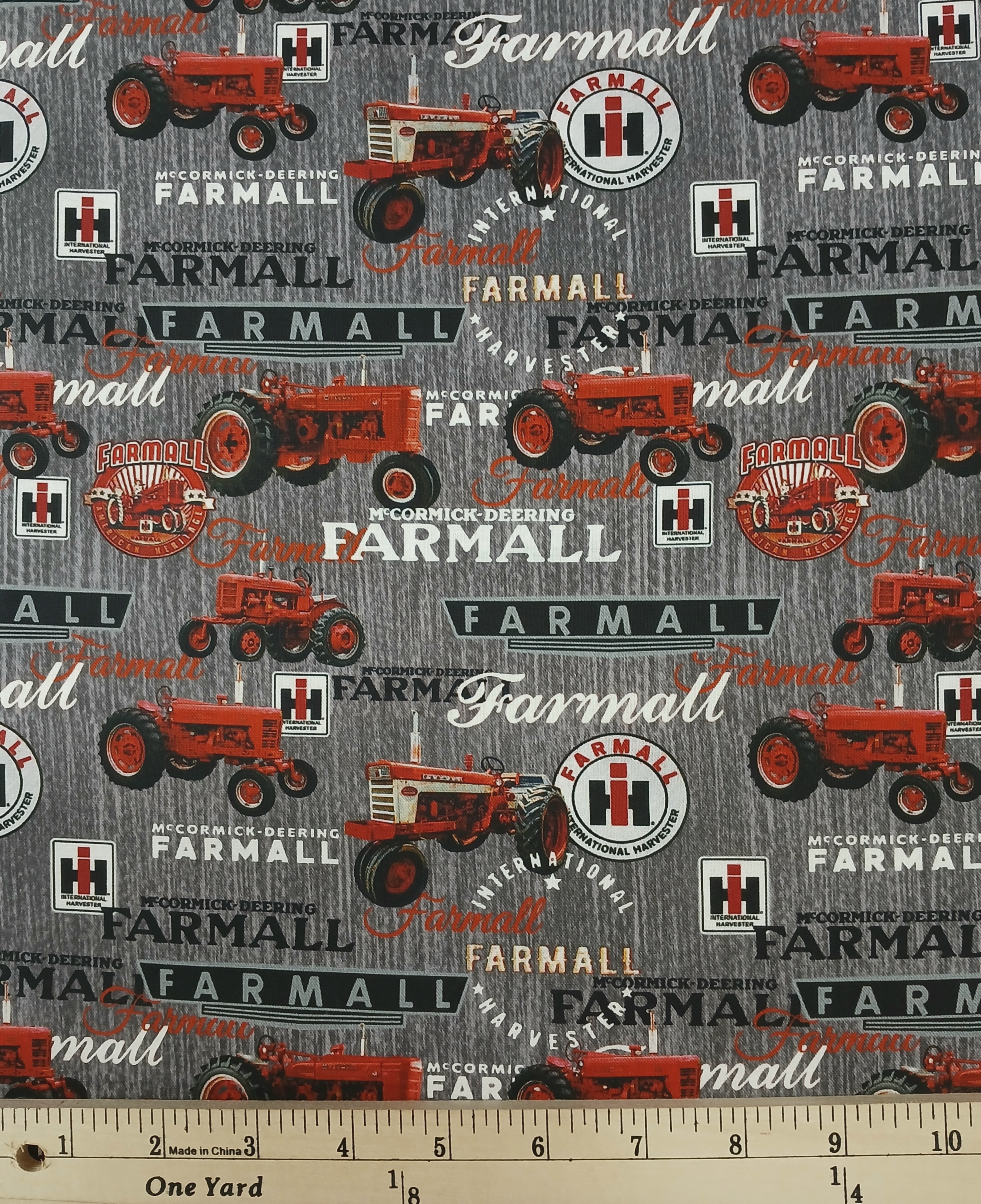 Cotton Farmall Logos and Tractors Tractor Farm Equipment Wood Officially Licensed by Sykel Enterprises Cotton Fabric Print by the Yard (10542-GRAY)