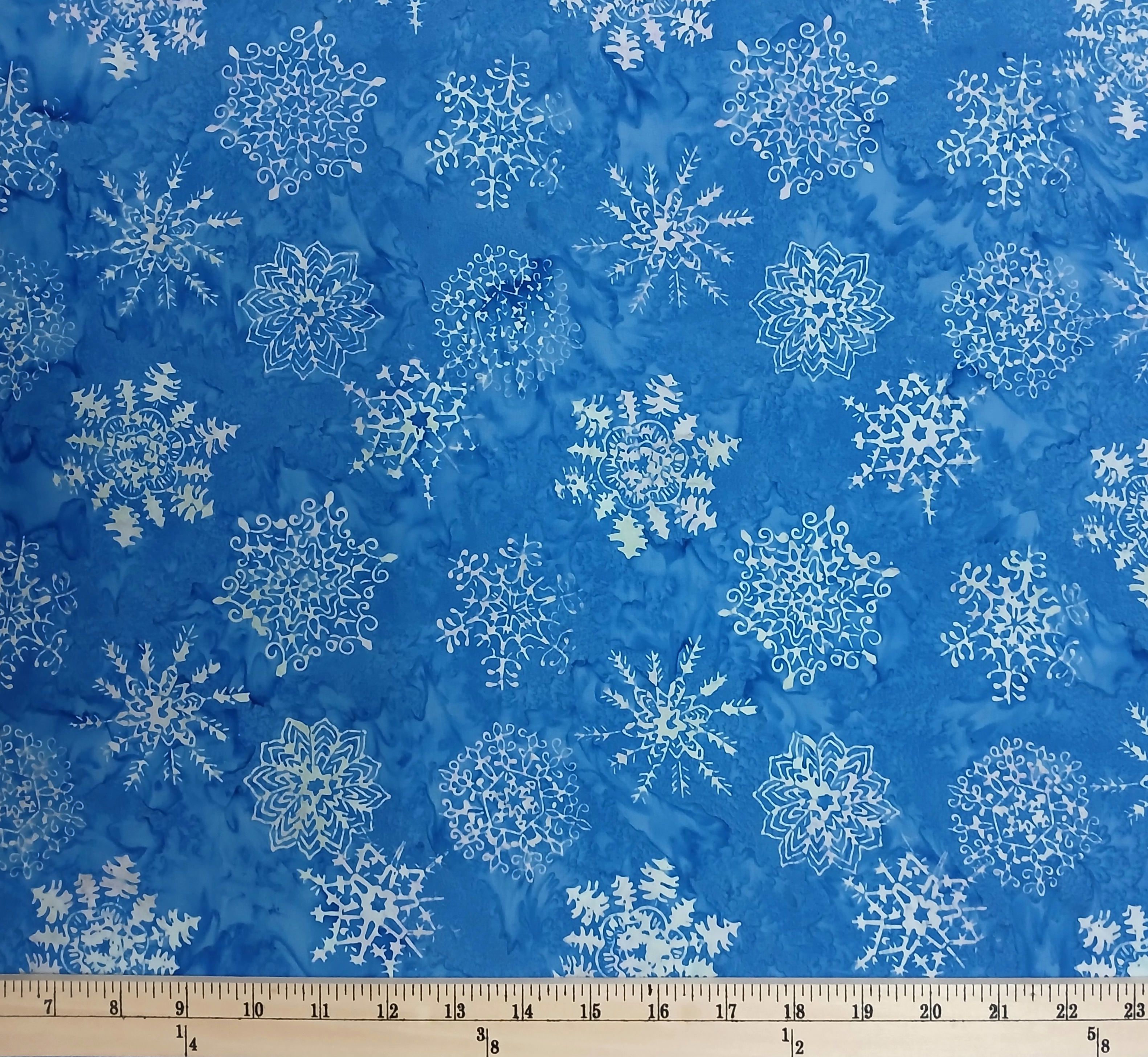 Cotton Tonga Batik Hand Dyed Winter Snowflakes on Swirled Blue Background Timeless Treasures Cotton Fabric Print by the Yard (TONGA-B3528-ROYAL)