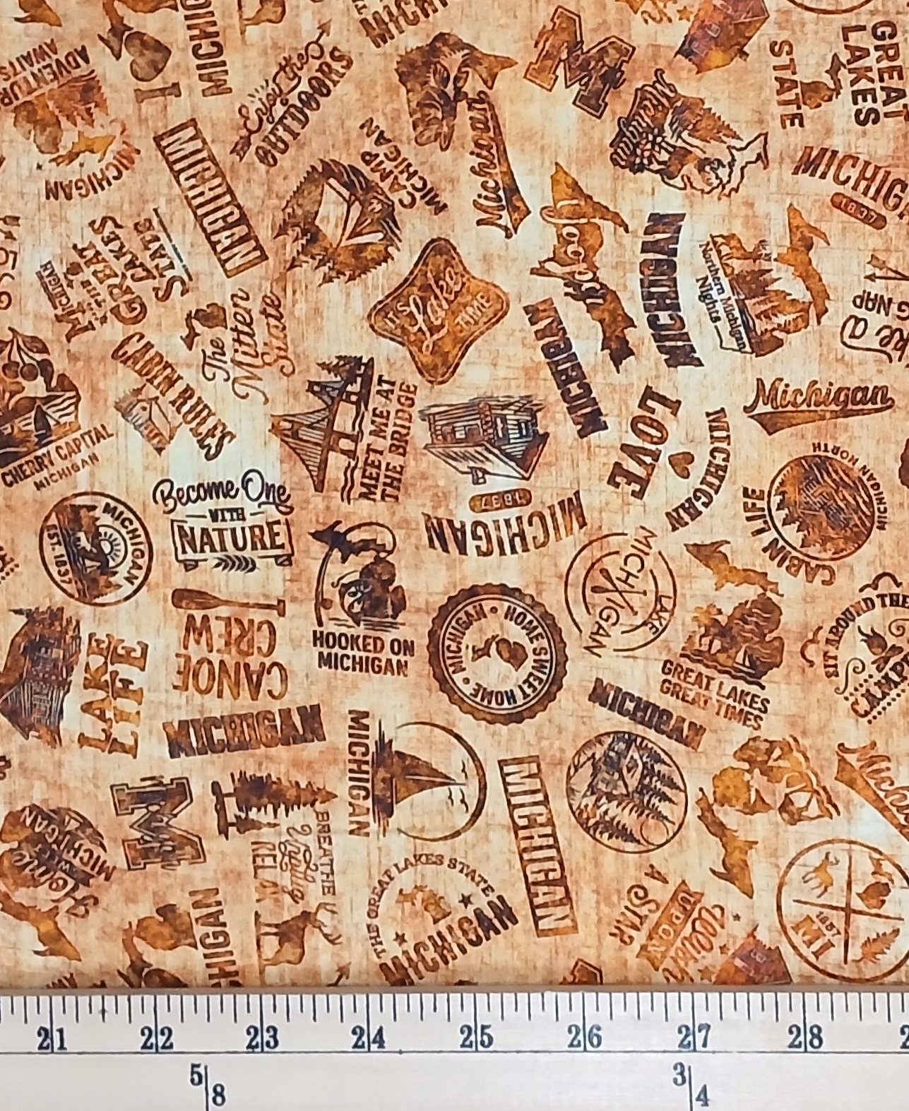 Cotton All Michigan Shop Hop 2026 Slogans Words Text Symbols State of Michigan Quilting Treasures Sand Cotton Fabric Print by the Yard (2600-32083-S)
